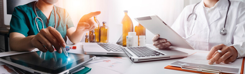 Medicine doctor using tablet with digital medical interface icons, Medical technology and network concept.