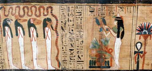 A closeup shot of a papyrus with Egyptian symbols
