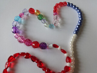 Obraz premium Necklace from Plastic Beads in a Heart Shape