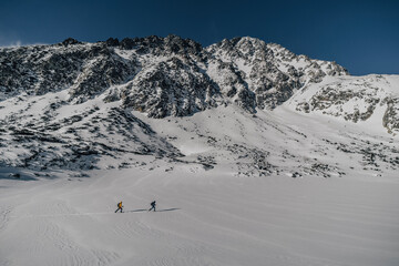 Ski touring in High Tatras, Slovakia. Winter touring on ski in deep powder snow.