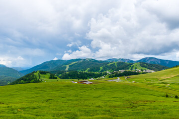 A picturesque landscape view of the French Alps mountains on a cloudy summer day (Valberg, Alpes-Maritimes, France)