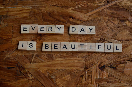 Every Day Is Beautiful Text On Wooden Square, Motivation And Business Quote