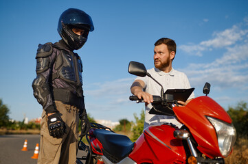 Fototapeta na wymiar Driving lesson on motordrome, motorcycle school
