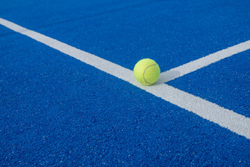 Paddle tennis ball on a paddle tennis court for background