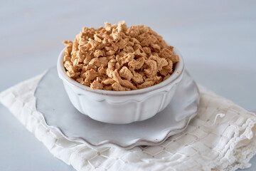 Raw textured soy meat on a porcelain bowl. Vegan food.