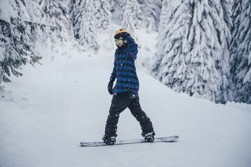person with snowboard