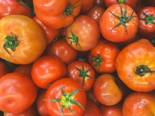 Fresh ripe red tomatoes in market