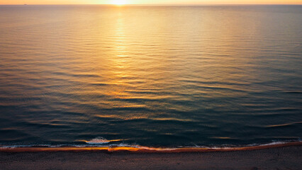 Fototapeta na wymiar Sunset over Ligurian sea. Beautiful seascape, aerial view.