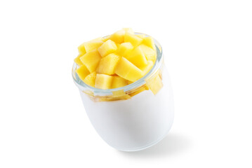 Greek yogurt with mango slices in a glass on a white isolated background