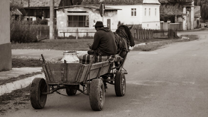 Horse carriage and farmer in Biertan Romania