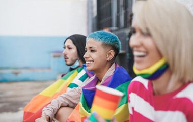 Diverse women having fun at gay pride parade - LGBT and homosexual love concept