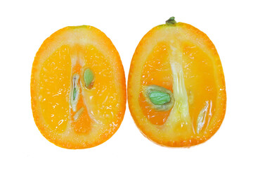 Sliced juicy kumquat isolated on white, macro close up.