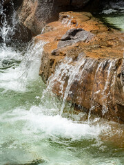 water flowing over rocks