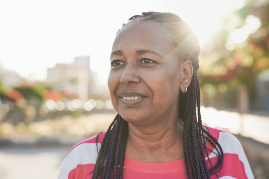 Portrait of happy african senior woman outdoor