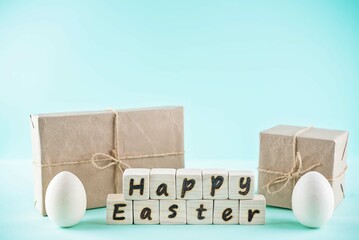 Easter background with eggs, cubes, gift