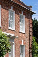 old brick house with windows