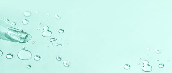 Liquid gel or serum pipette with drops background