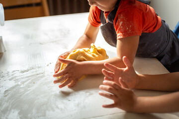 kid kneading dough
