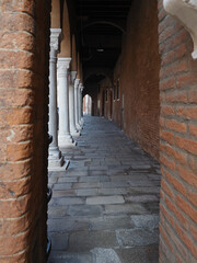 Ferrara, Italy. Colonnade of the fourteenth-century Cana Minerbi Del Sale.