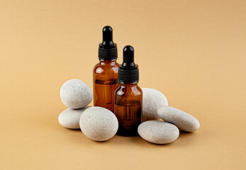 Cosmetic product for facial care. Two bottles filled with essential oil, essence, serum for women's...