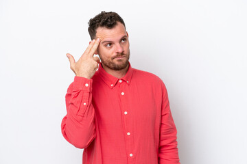 Young Brazilian man isolated on white background with problems making suicide gesture