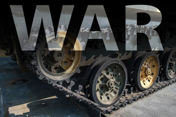 tracks and wheels of tank, armored vehicles on the street in green khaki color