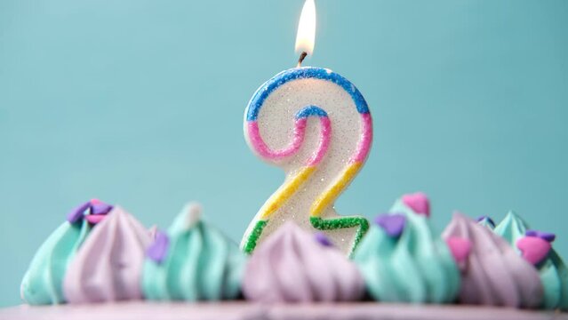 birthday cake with birthday candle on color background 