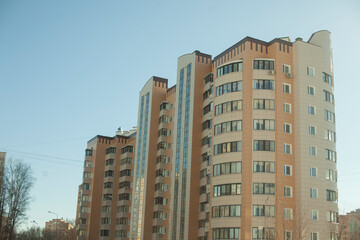 Fototapeta premium Building in city. Urban development. Details of big city.