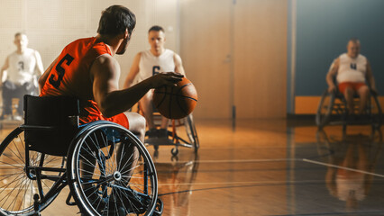 Fototapeta na wymiar Wheelchair Basketball Game Court: Active Professional Player Dribbling Ball, Prepairing to Shoot and Score a Goal. Determination, Inspiration, and Skill of a People with Disability.