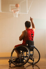 Wheelchair Basketball Play: Player Shooting Ball Successfully, Scoring a Perfect Goal. Skill of a...
