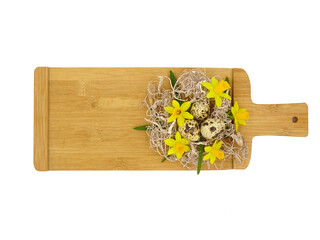 Easter decoration on a wooden board, place for text.
