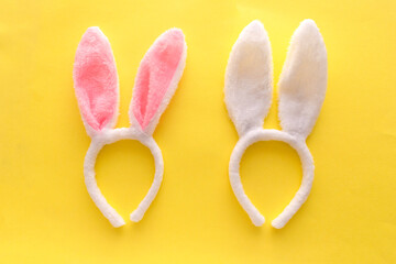 Happy Easter holiday concept, bunny ear on yellow background.