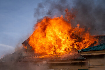 A two-story house fully engulfed structure fire