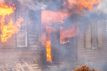A two-story house fully engulfed structure fire