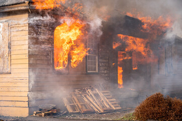 A two-story house fully engulfed structure fire