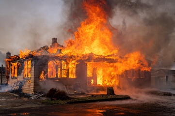 A two-story house fully engulfed structure fire