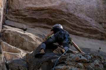 Obraz premium Rock Climber climbing the route Para mis amigos in Suesca Colombia