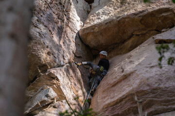 Rock Climber climbing the route Para mis amigos in Suesca Colombia