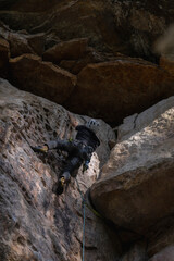 Rock Climber climbing the route Para mis amigos in Suesca Colombia