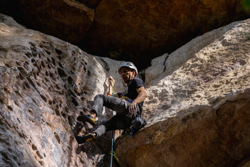 Rock Climber climbing the route Para mis amigos in Suesca Colombia