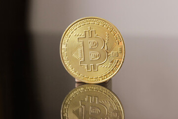 Close up Bitcoin coin in shopping cart on black background