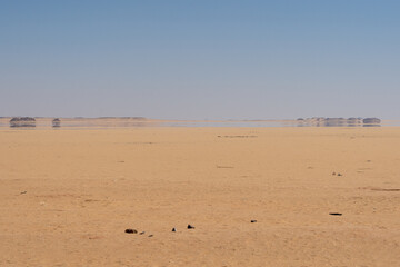 Looks like near is a water, but in truly it's only a mirage. Egypt.