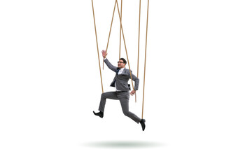 Businessman puppet being manipulated by ropes