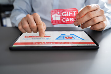 Holding Gift Card While Using Tablet