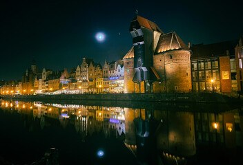 view of the waterfront of Gdańsk at night  - obrazy, fototapety, plakaty
