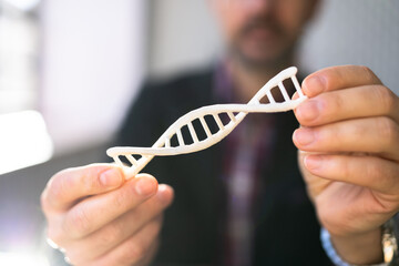 DNA Molecule In Hand. Biochemistry Science