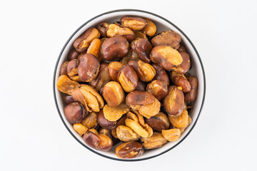Crispy broad beans on white background