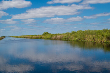 florida everglades white cloud reflections in the water