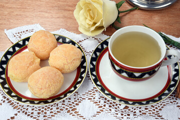 table with coffee cup with cookies cheese breakfast snack