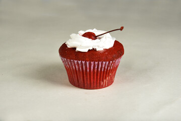 cakecup red fruit cake with whipped cream with party candy